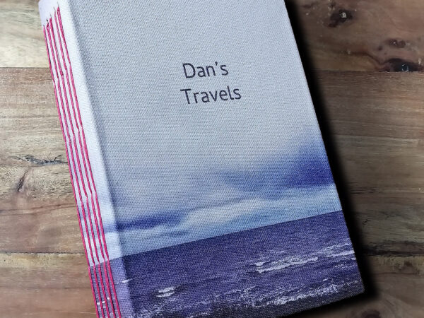 Journal - Dan's Travels - on table top.