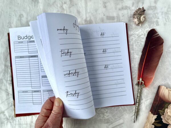 Red and white rose diaries showing diary and planners