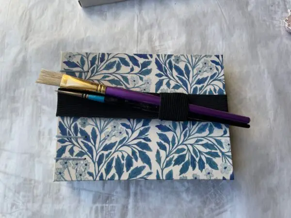 Blue Floral watercolour sketchbook with elastic ben/brush holder